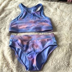 THIS SWIM SUIT IS AMAZING!! fits sooo well. Each piece was 32.